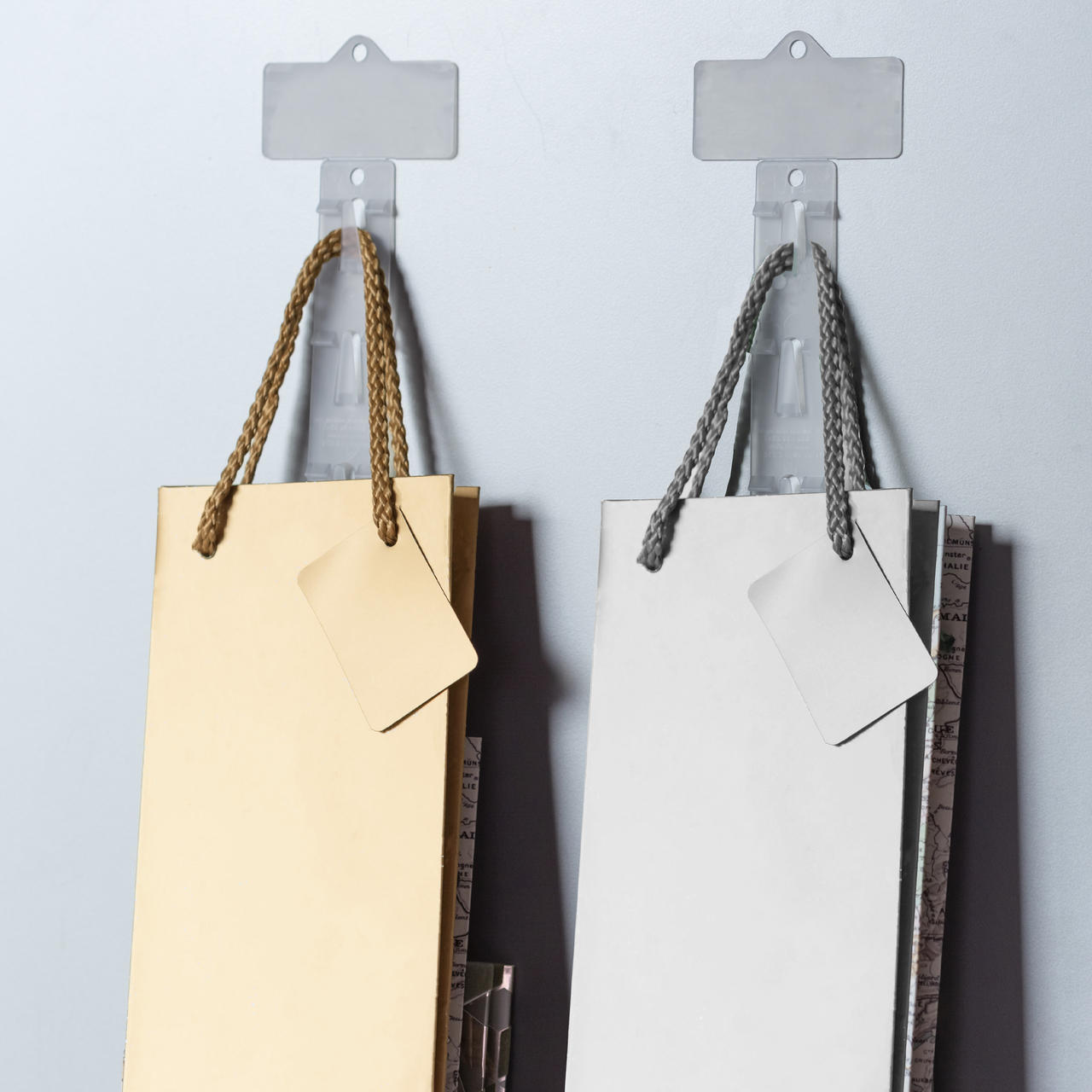 1 Bottle laminated gift bag featuring a patterned finish and heavy-duty handles.