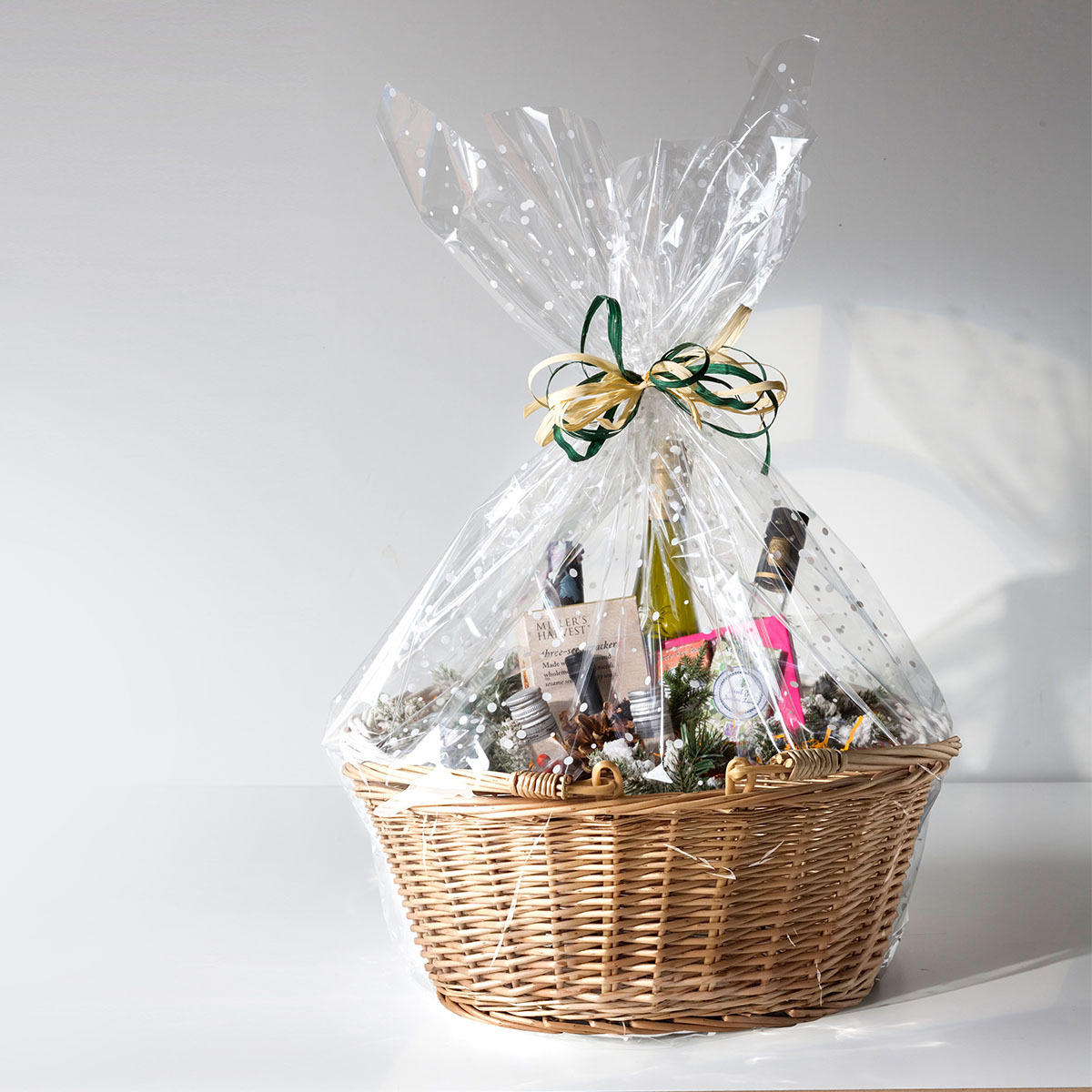 Medium oval natural wicker basket hand-woven from natural split-wicker.