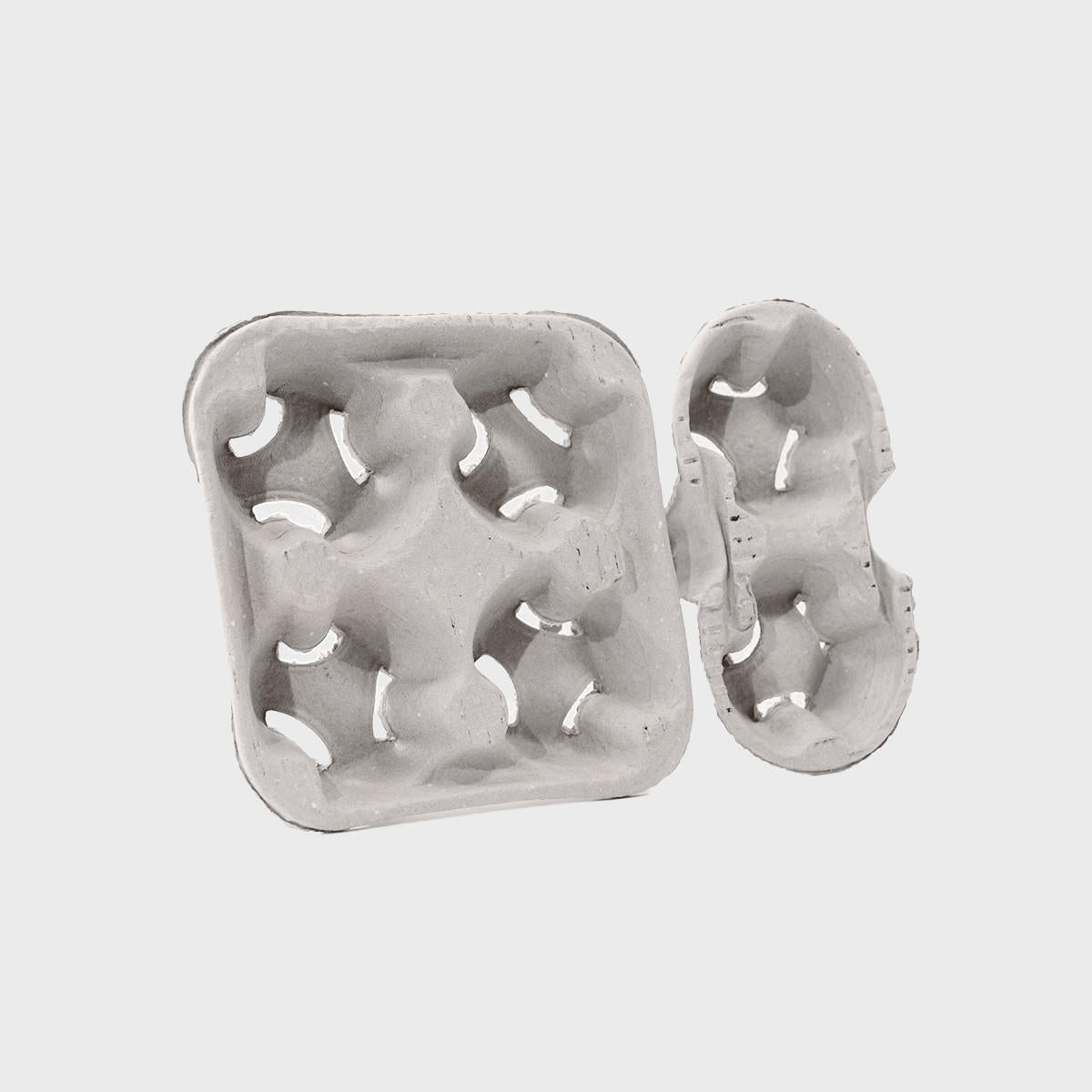 Pulp cup carrier tray with structured, low-profile walls and open-top design.