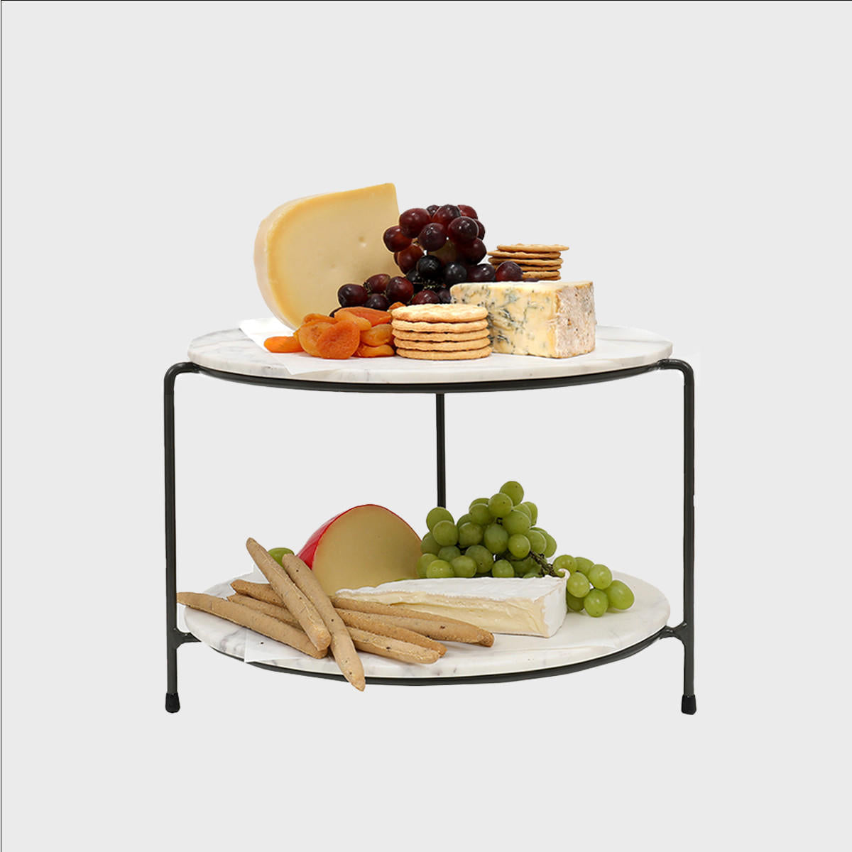 Leander metal tiered riser with light grey marble serving board with polished grey marble texture adding dimension.