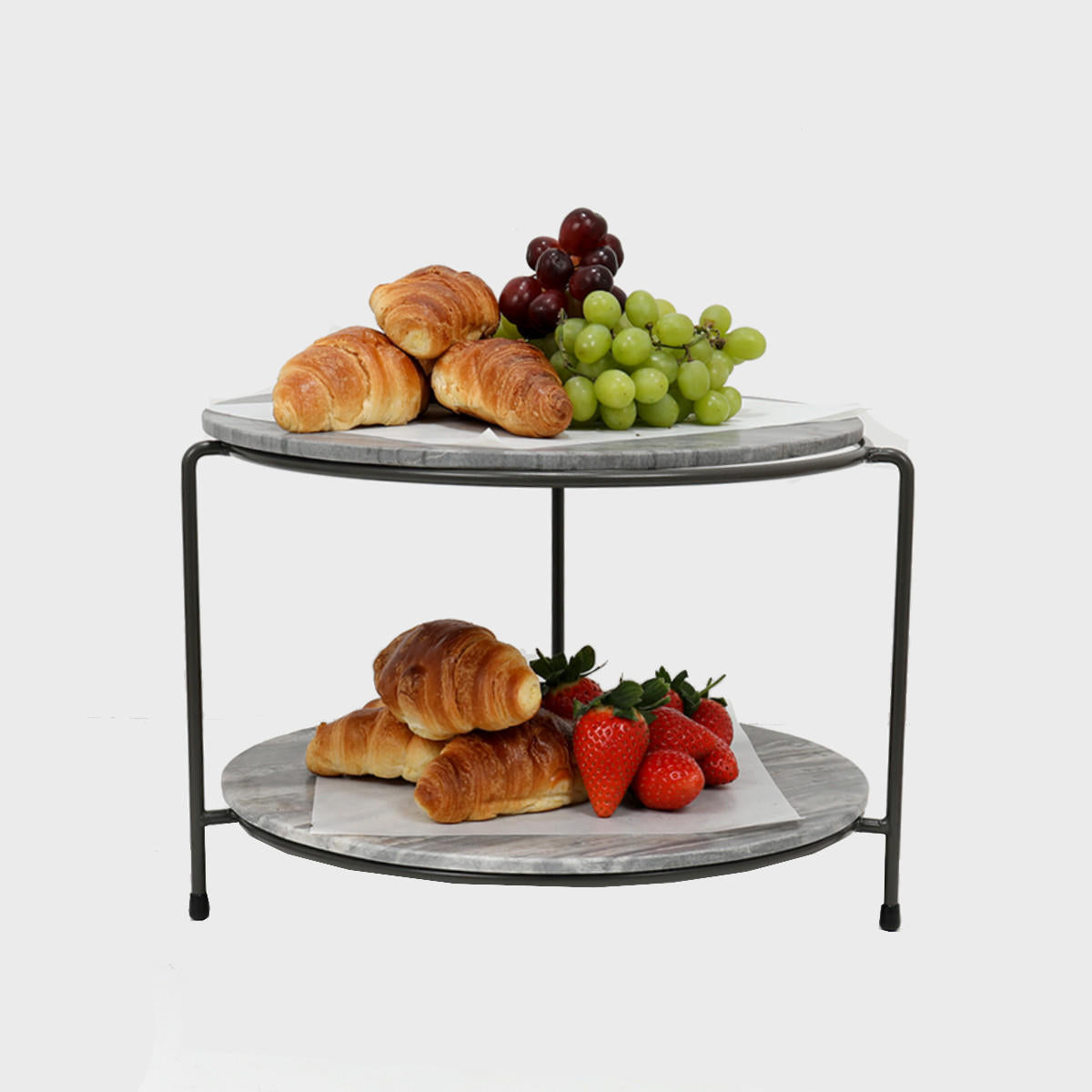 Leander metal tiered riser with dark grey marble serving board with polished grey marble texture adding dimension.