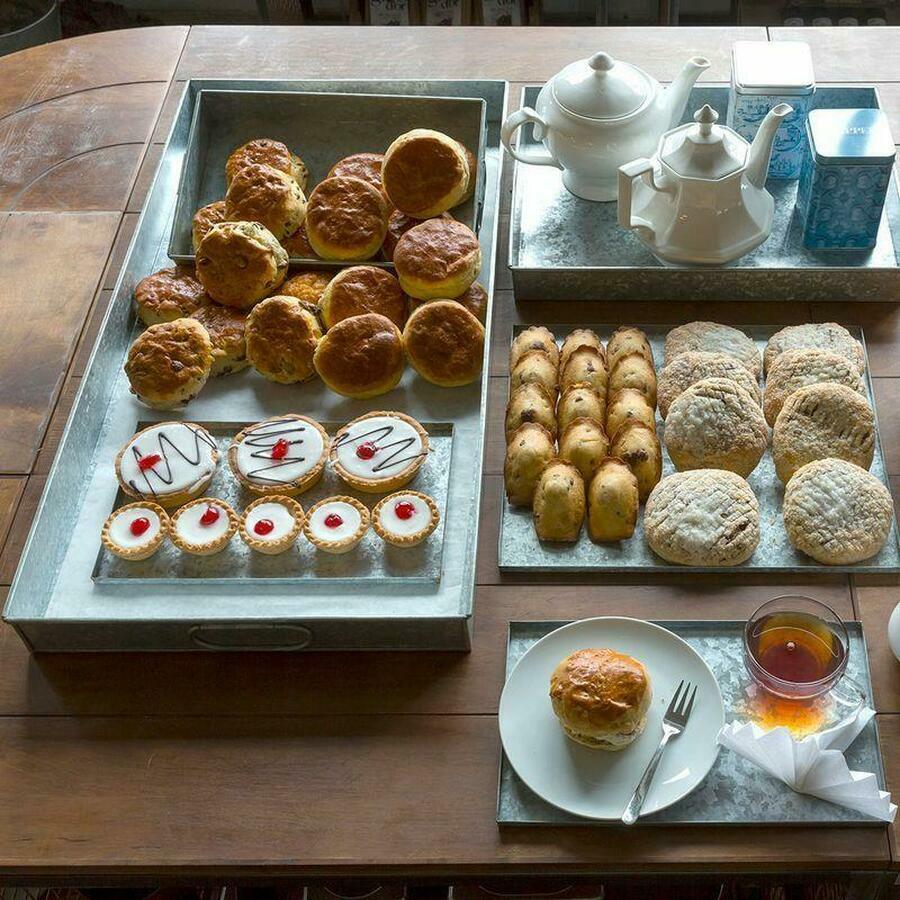 Metal trays nested set of 5 with structured, low-profile walls and open-top design.