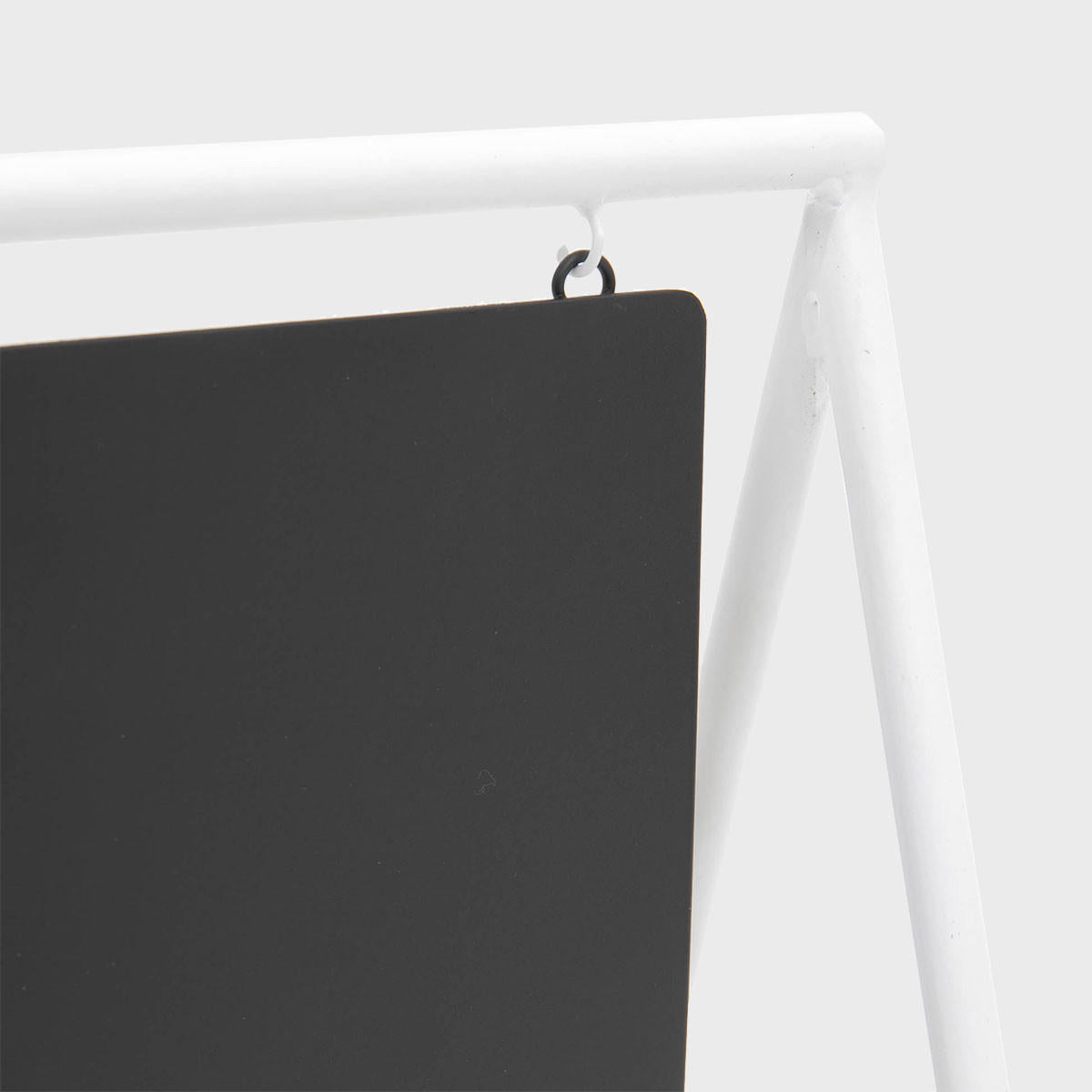 Square black and white table sign.