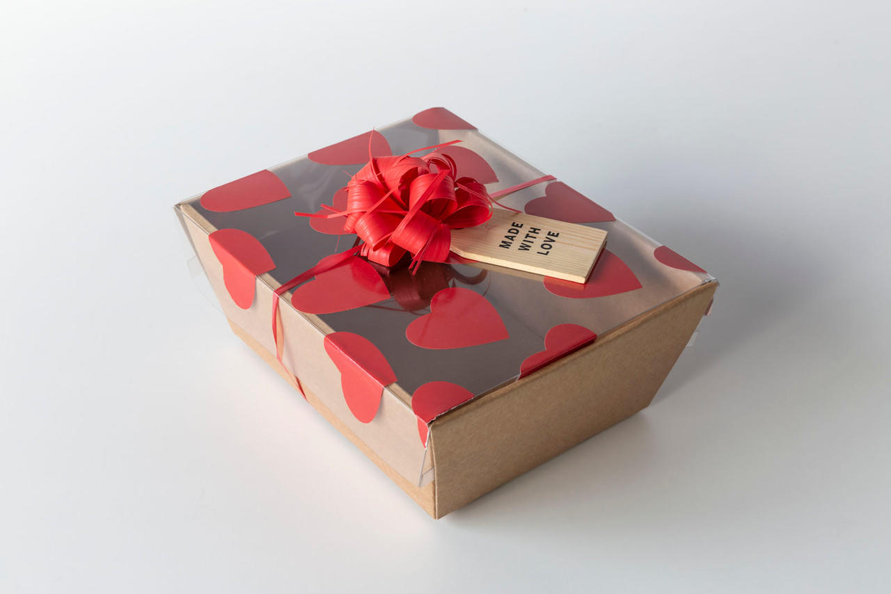 55mm red heart shape sticker (100 p/roll) with a high-quality finish used as a decorative accent.