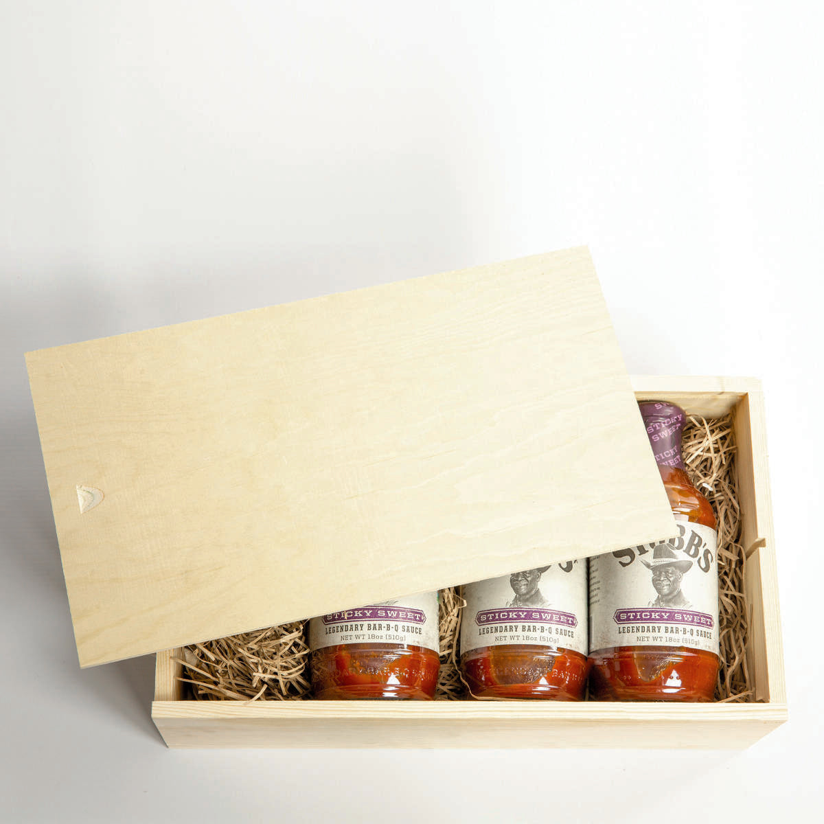2 Bottle wooden box with rope handle with premium natural wood grain and secure hardware closures.