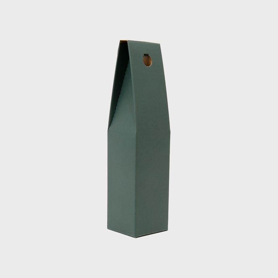 1 Bottle gift box from high-density rigid paperboard in green.