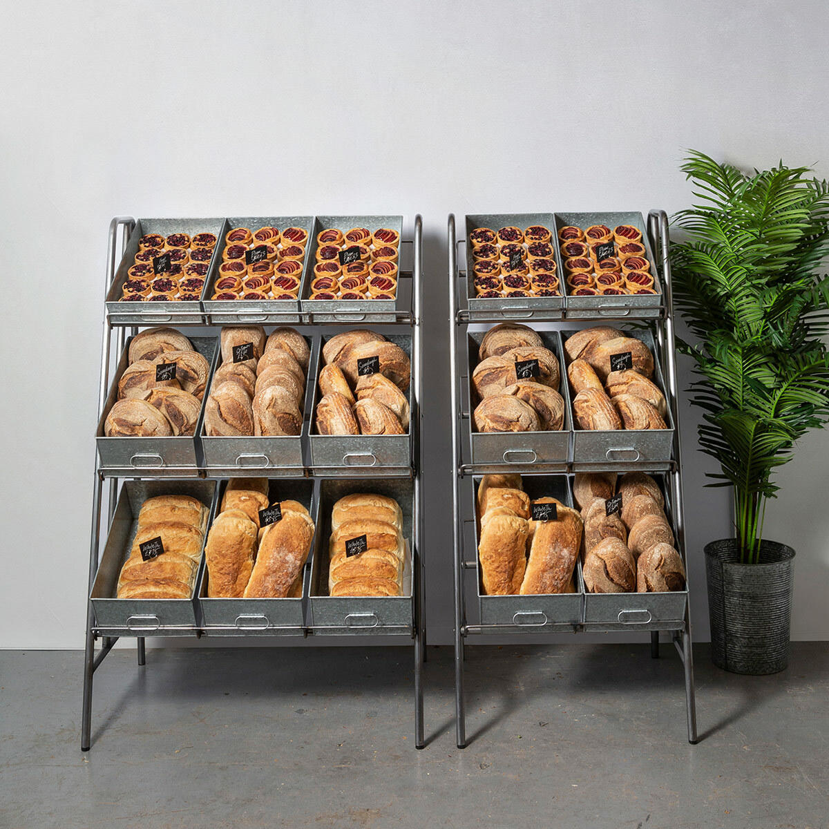Camberwell retail stand 3 shelf with chatto metal tray featuring a multi-tiered layout for product positioning.
