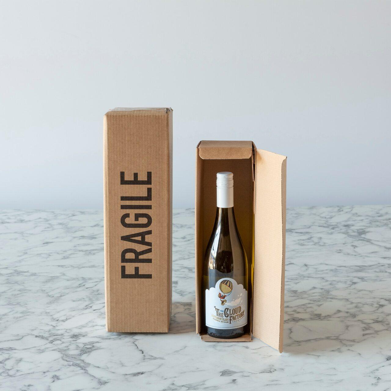 1 Bottle lay flat gift box from high-density rigid paperboard.