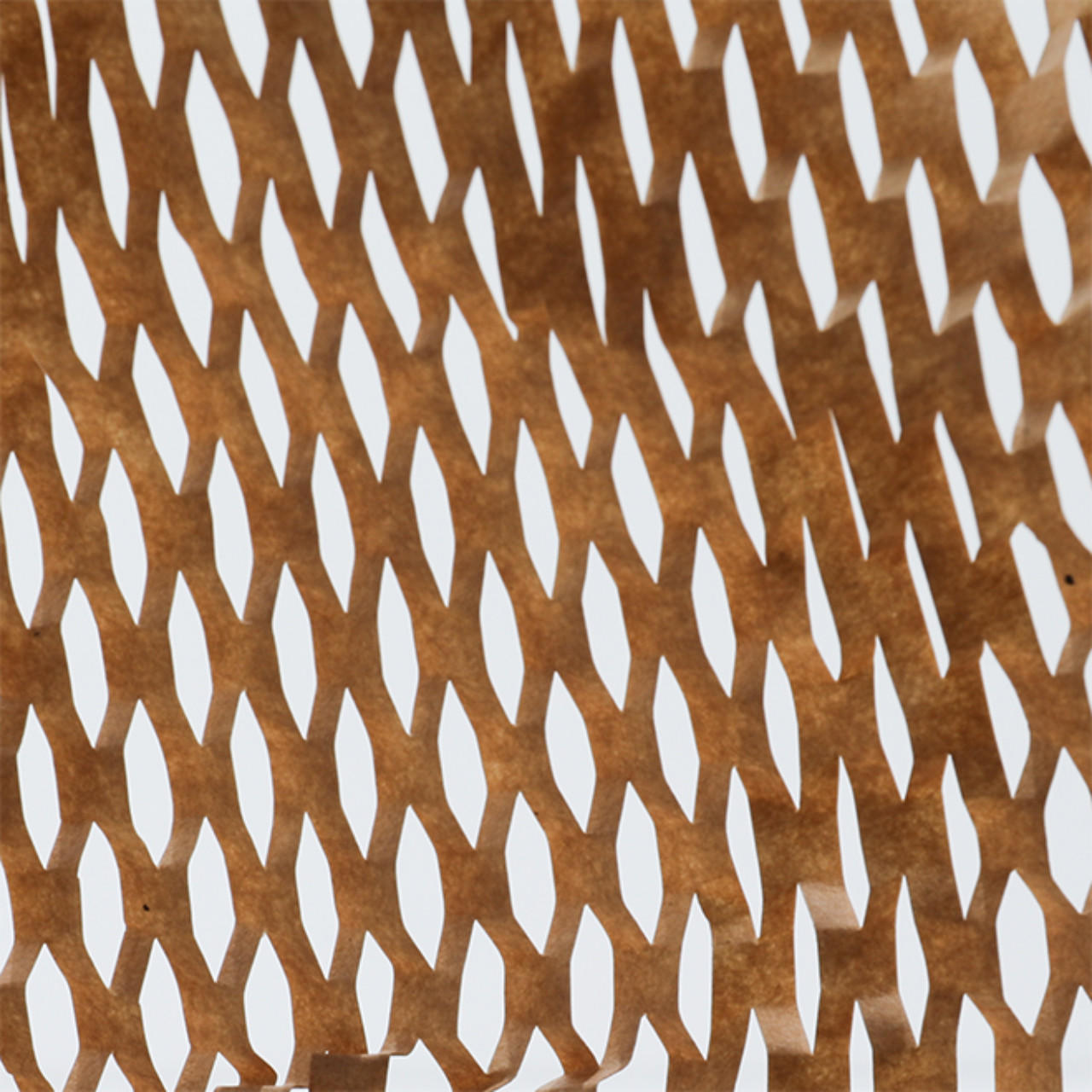 Honeycomb paper dispenser with kraft wrap.