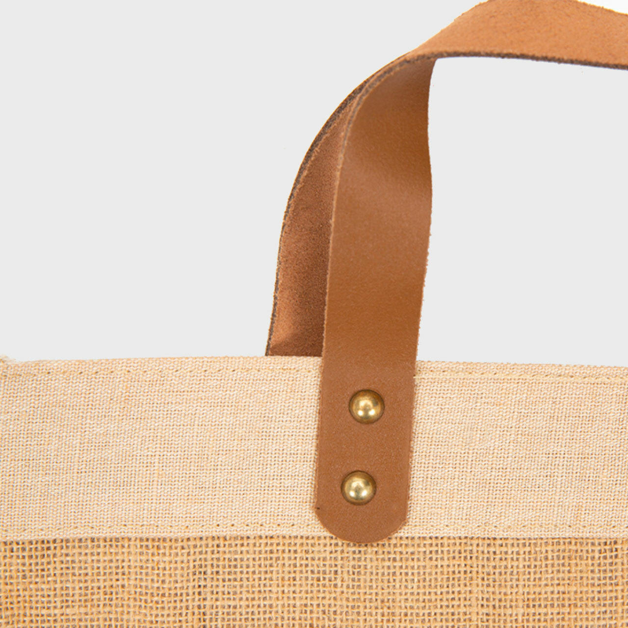 Medium natural jute market bag with leather handles.