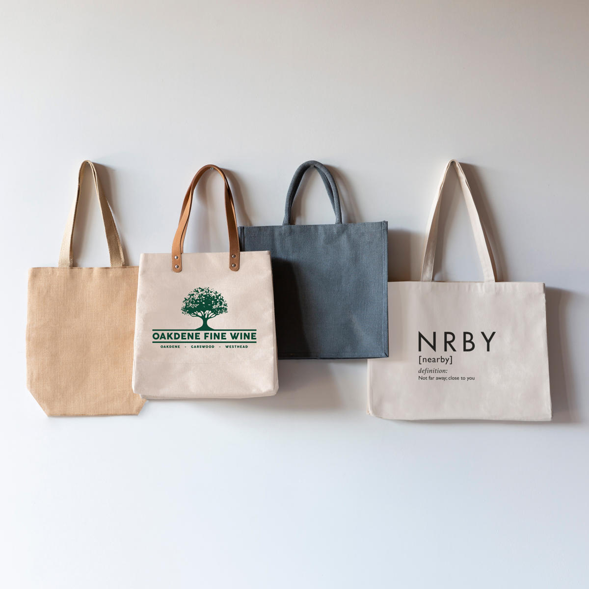 Large natural juco shoulder market bag with leather handles.