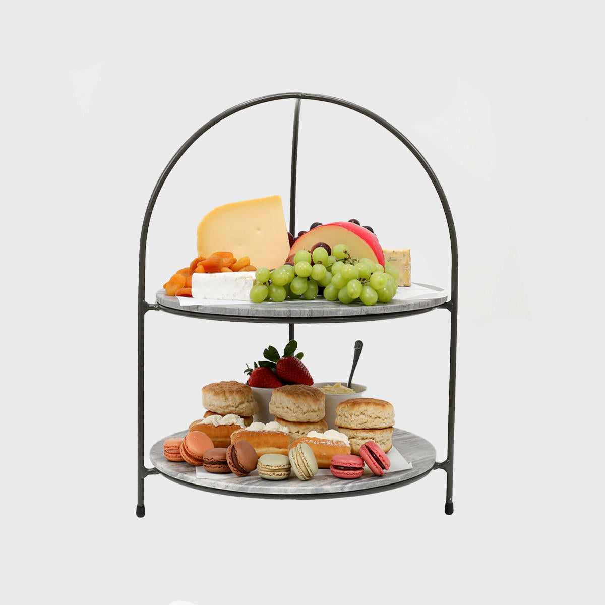 Leander metal tiered riser with dark grey marble serving board with polished grey marble texture adding dimension.
