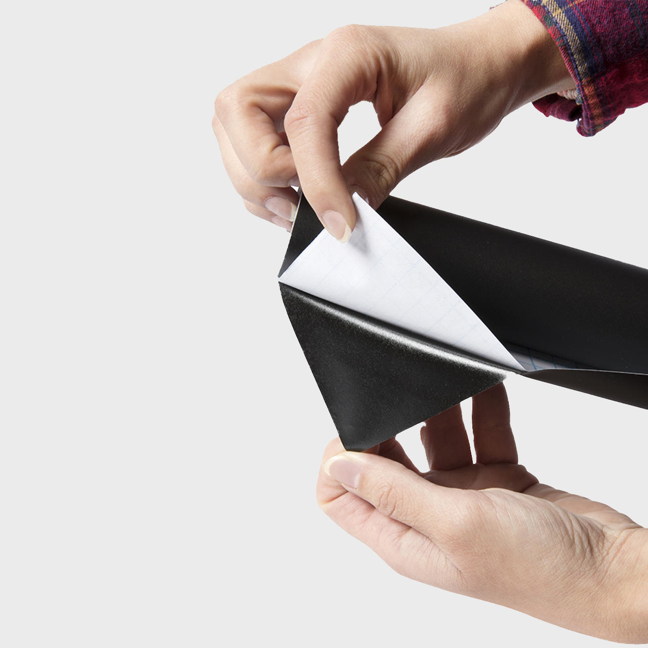 Self-adhesive chalkboard roll with a clean surface for visible retail messaging.