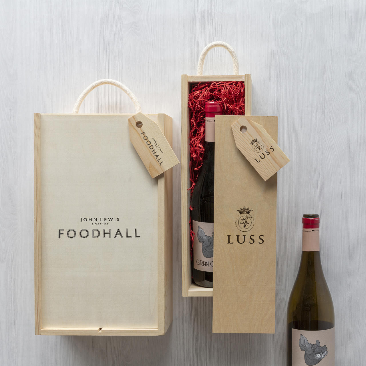 1 Bottle wooden box with rope handle with premium natural wood grain and secure hardware closures.