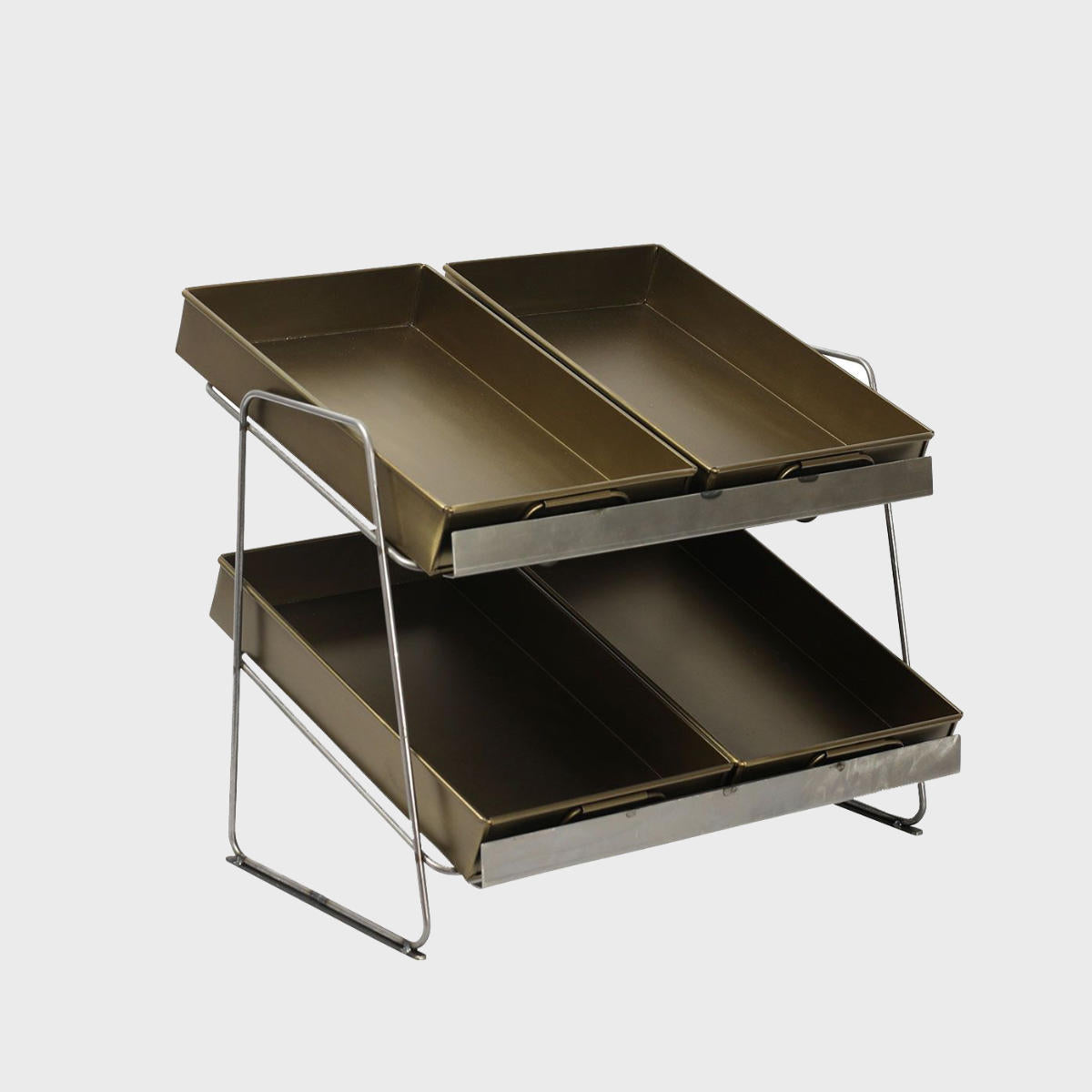 Railton tiered countertop display unit with small brass metal trays multi-tiered layout for product positioning.
