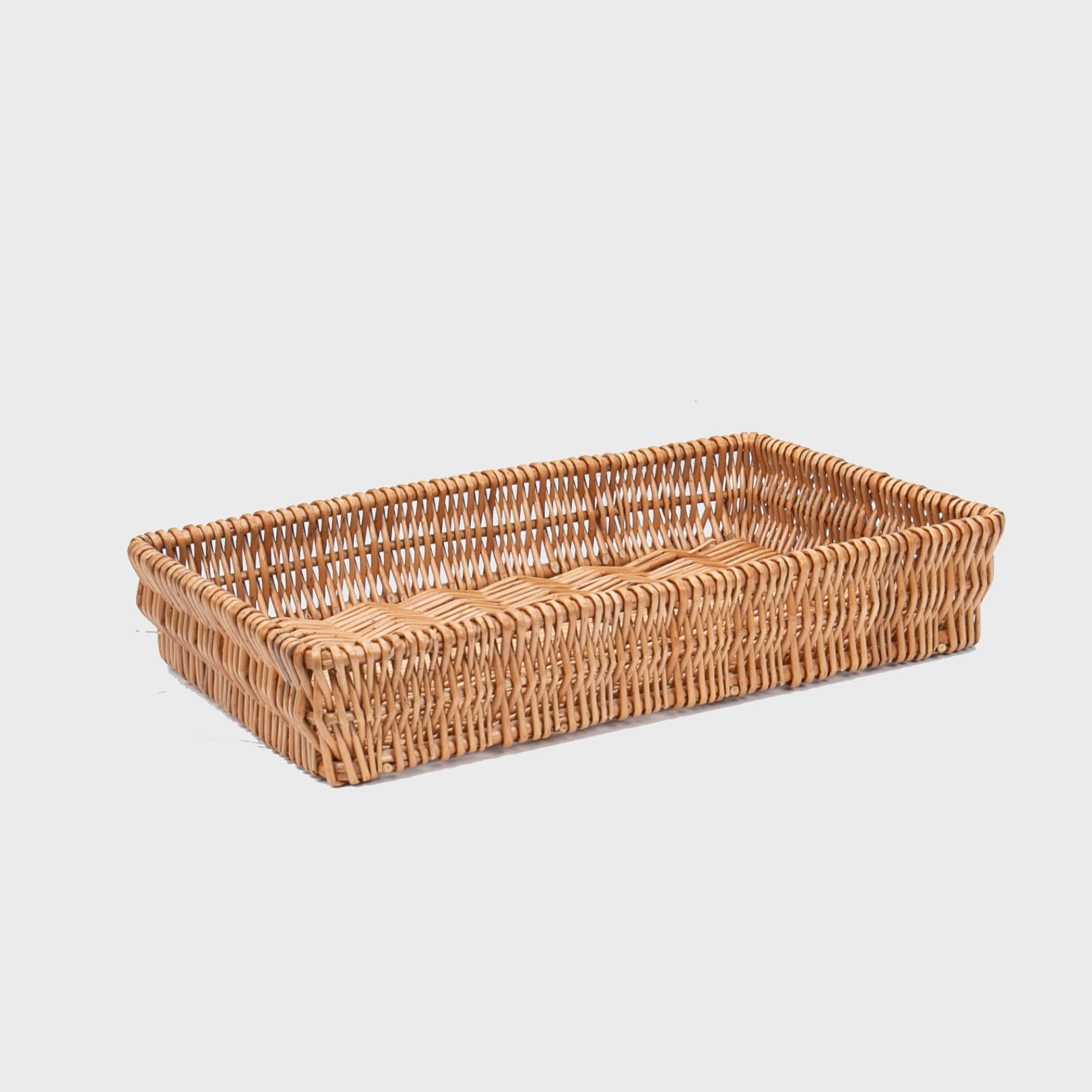 Shallow wicker basket hand-woven from natural split-wicker.
