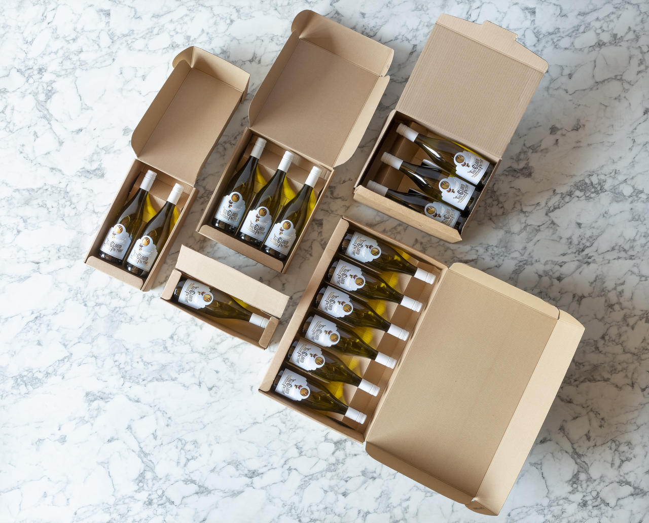 Flat 6 bottle card gift box from high-density rigid paperboard.