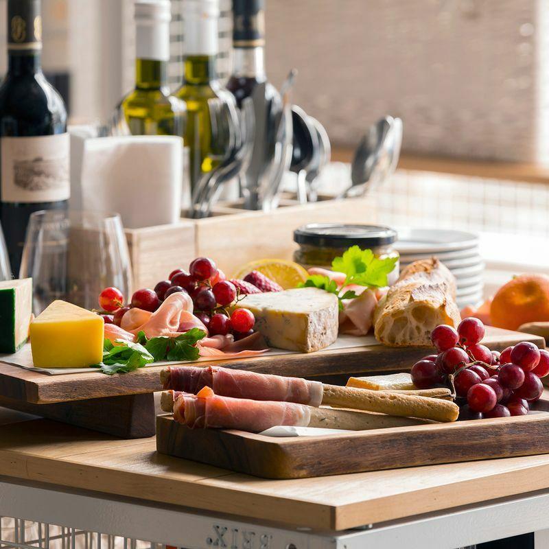 Scooped wooden serving board crafted from durable hardwood with natural grain detail.