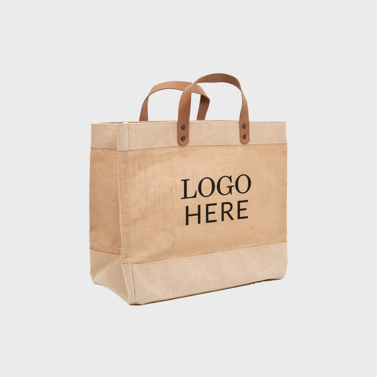Large natural jute market bag with leather handles.
