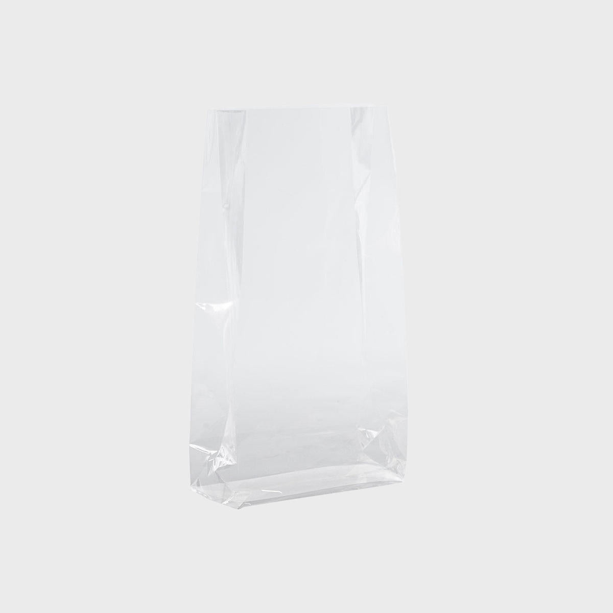 Cellophane gift bag featuring a patterned finish and heavy-duty handles.