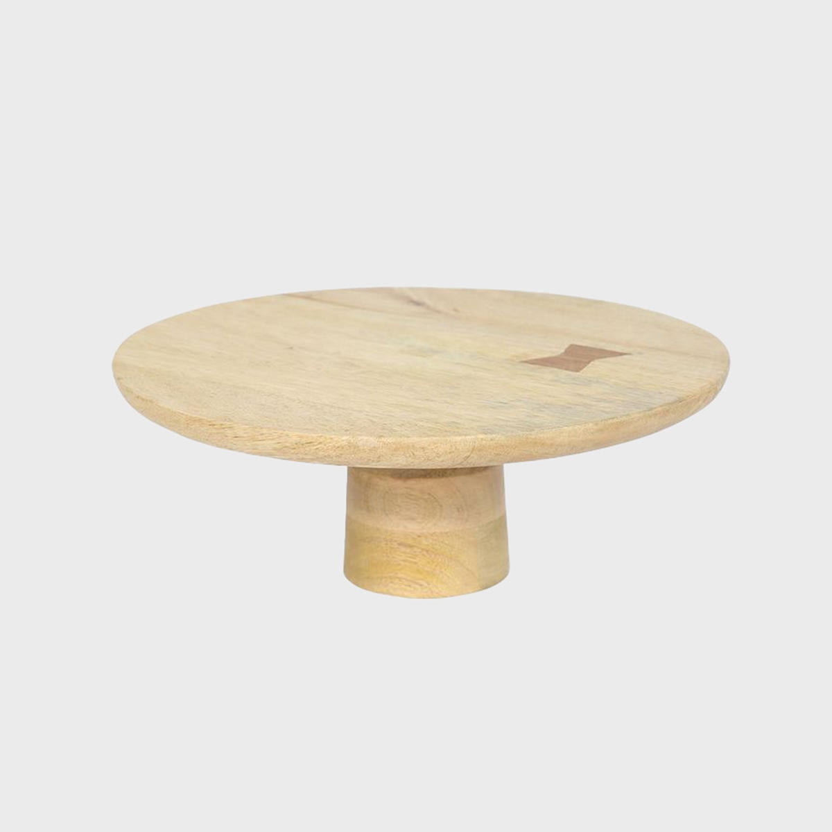 Mango wood wooden cake stand featuring a stable base and decorative scalloped edge.