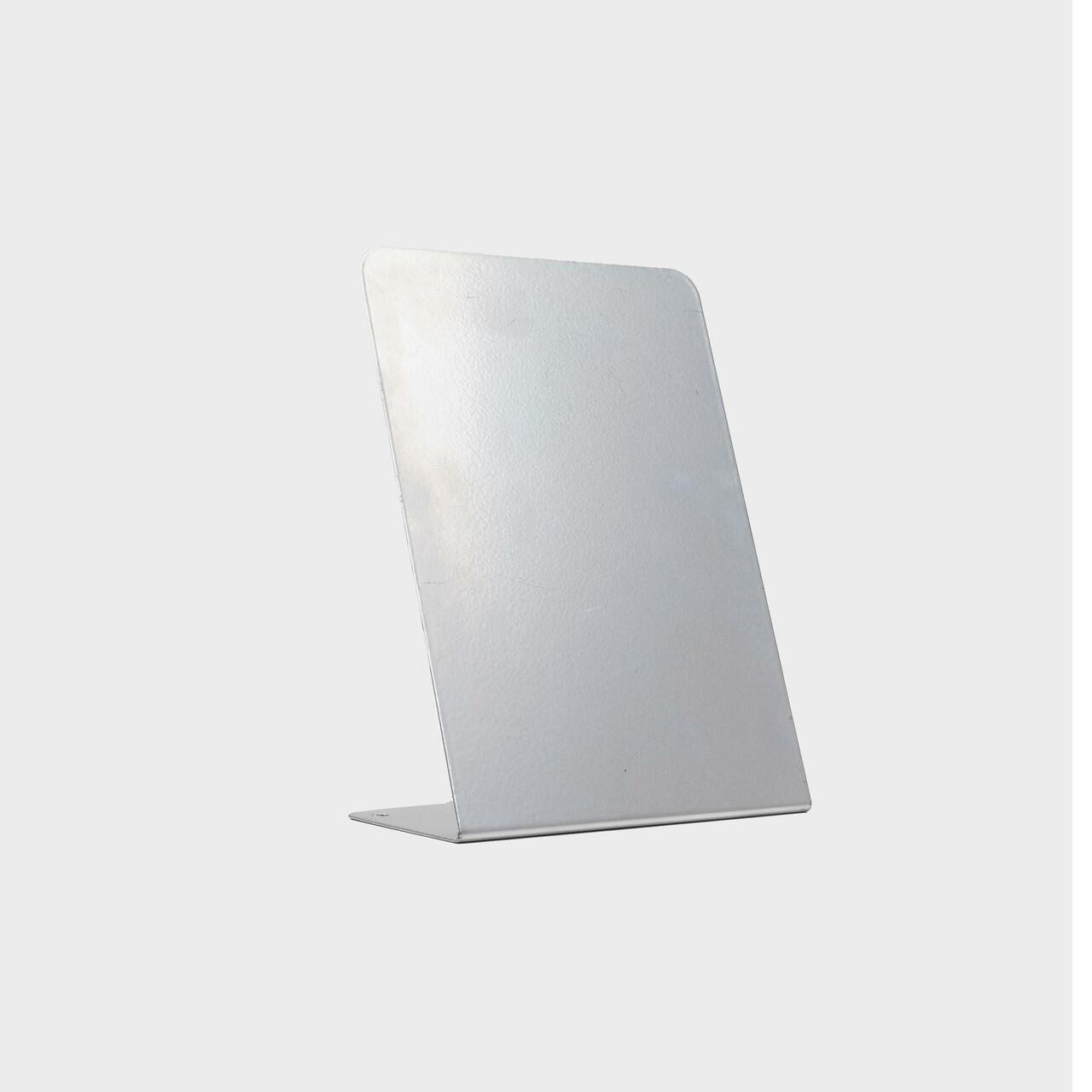 L shaped grey display easel.
