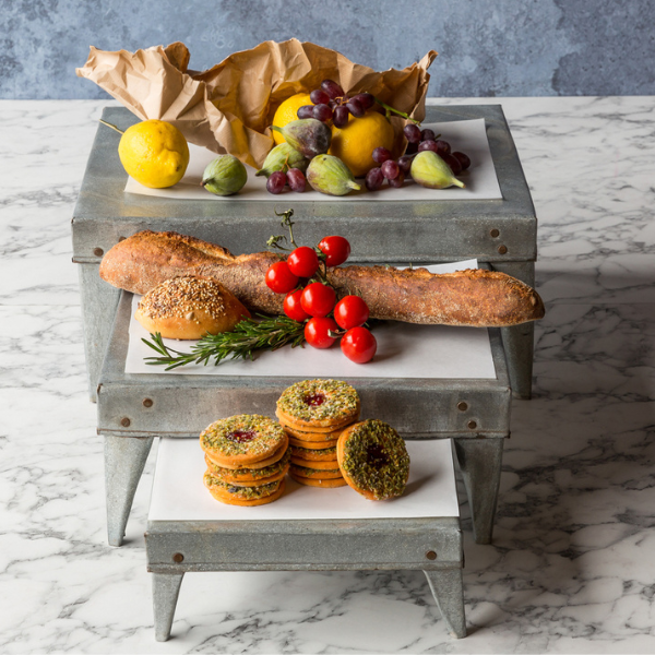 Steel risers for food displays